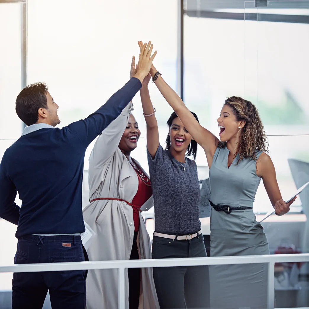 Professional team celebrating a successful project